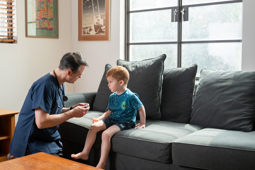 Locum home visit GP arriving at a patient's home